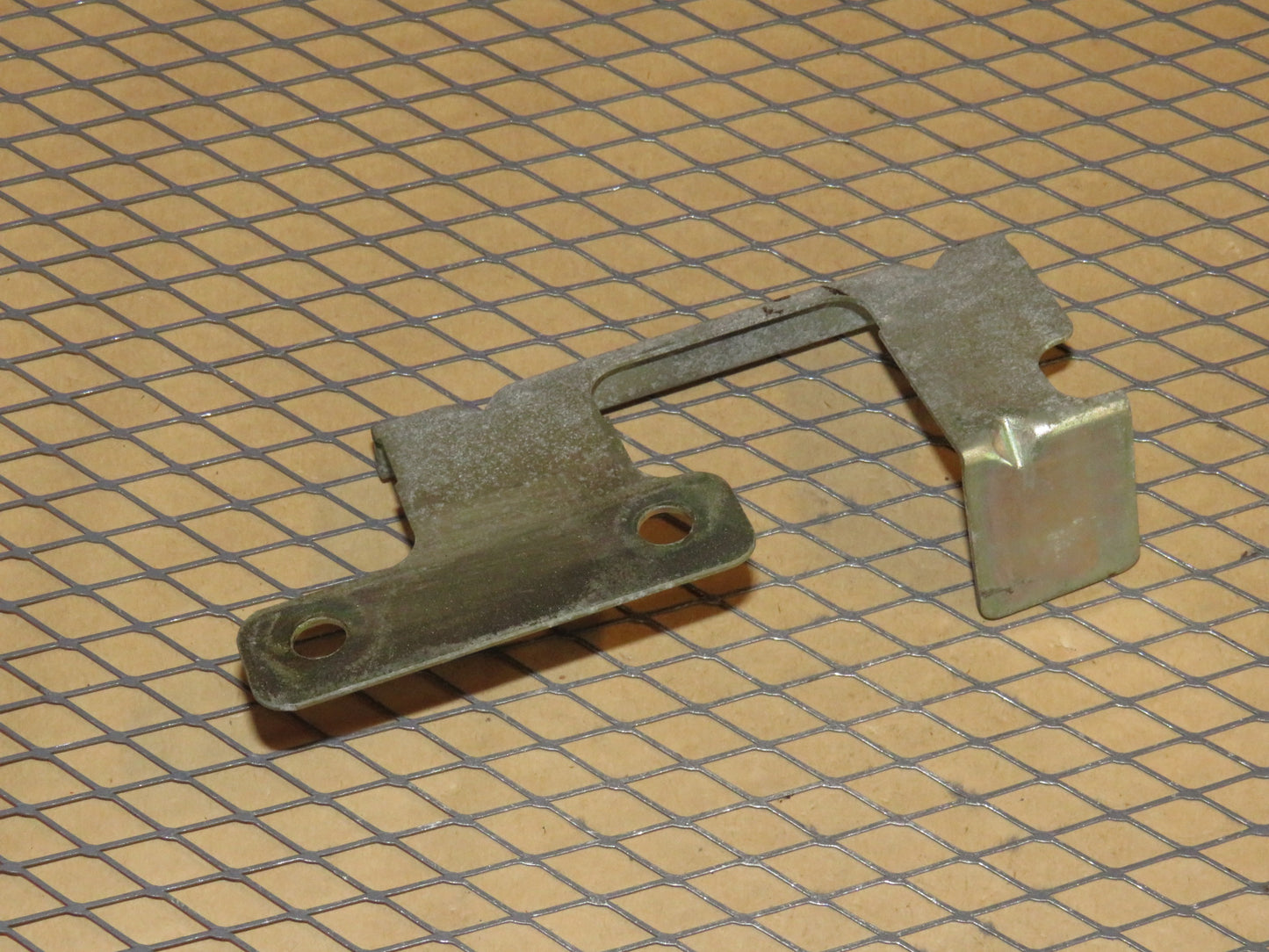 87 88 89 Nissan 300zx OEM Exterior Door Handle Mounting Bracket - Left