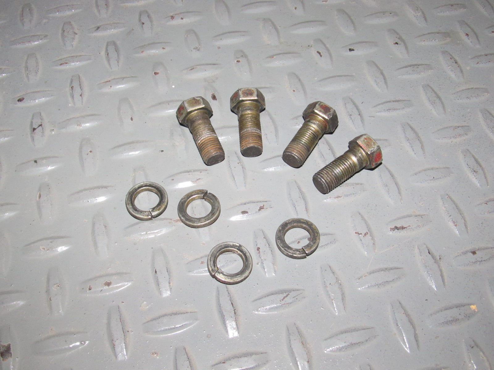 93 94 Mitsubishi Eclipse OEM Front Brake Caliper Mounting Bolt Set