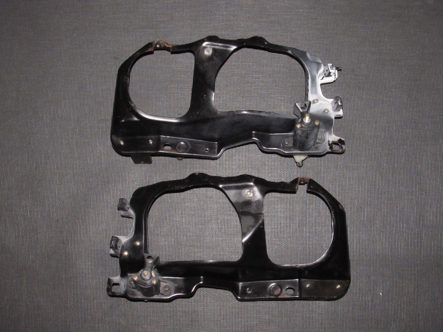 88 89 Honda CRX OEM D15B2 Headlight Mounting Bracket Set