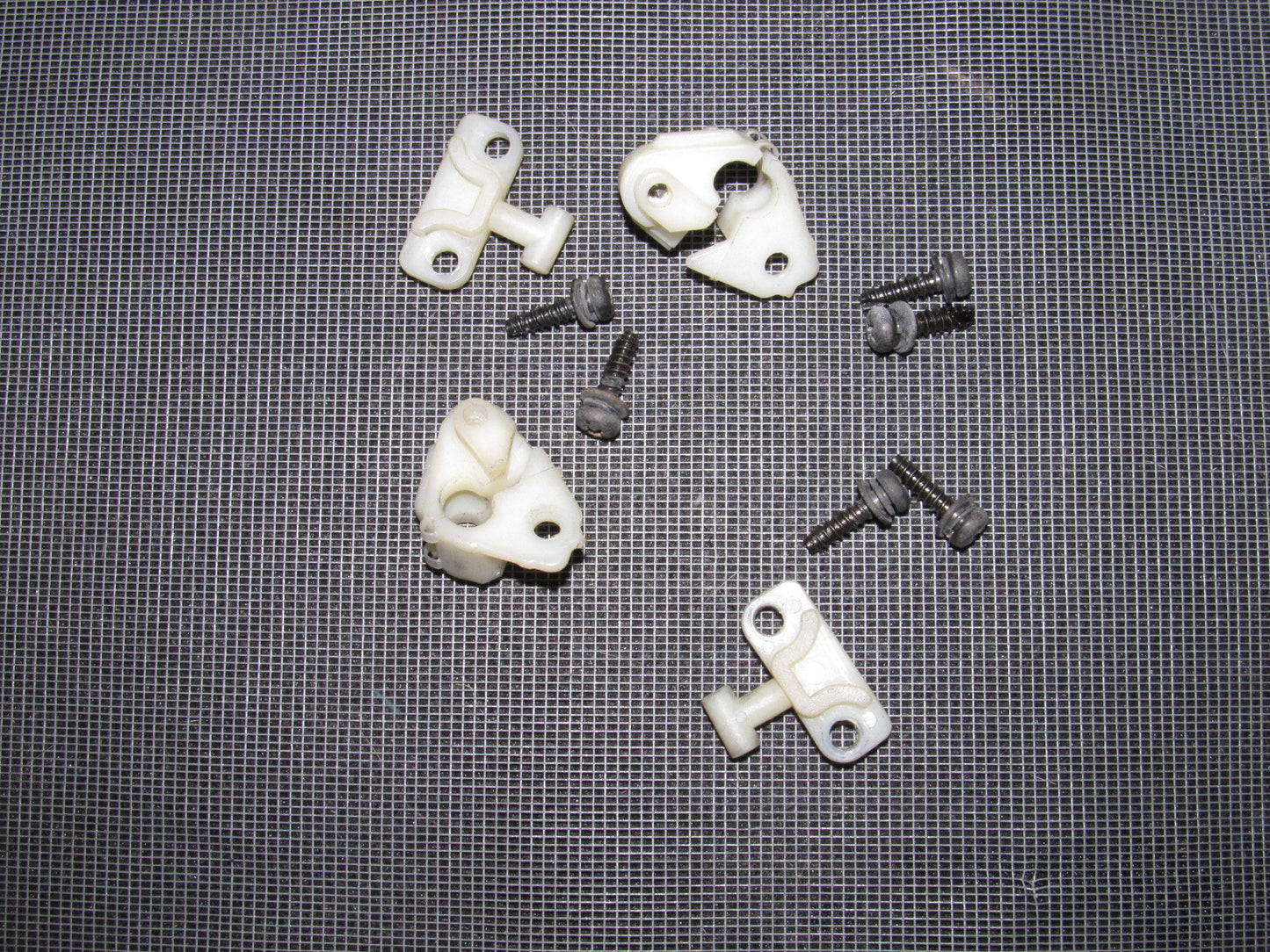 88 89 Honda CRX OEM D15B2 Headlight Mounting Bracket Set