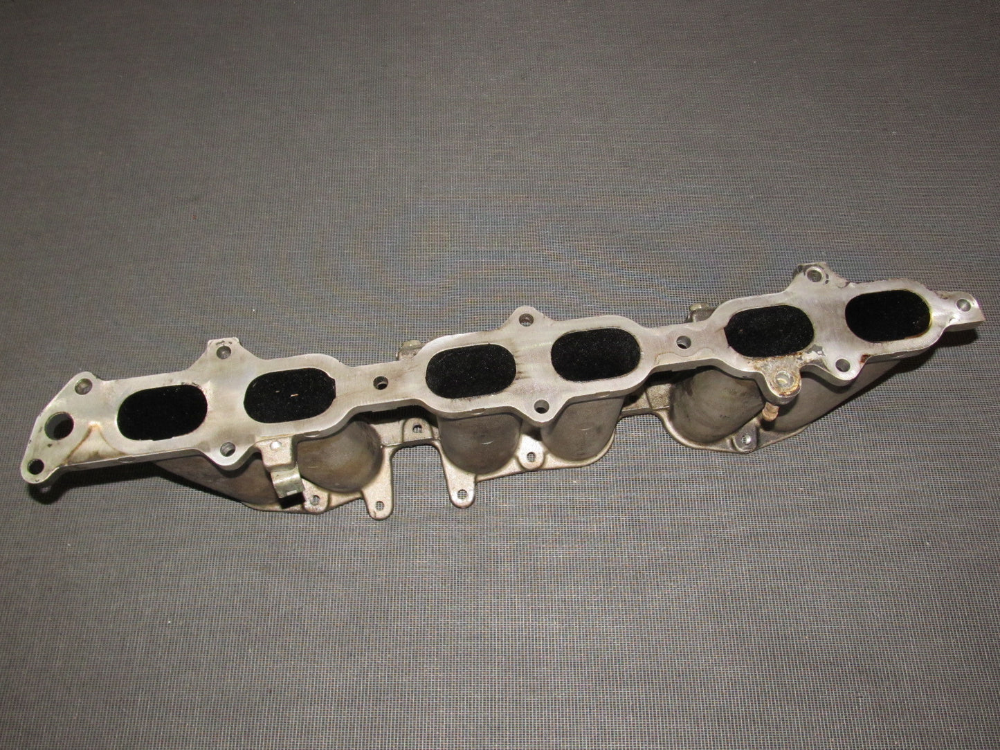 86 87 88 Toyota Supra OEM Turbo Lower Intake Manifold Runner