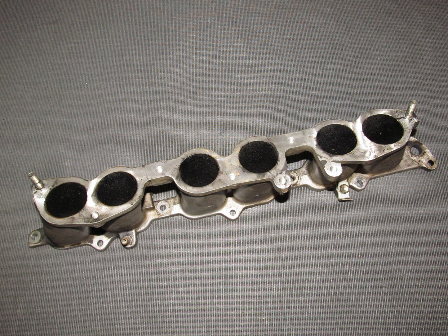 86 87 88 Toyota Supra OEM Turbo Lower Intake Manifold Runner