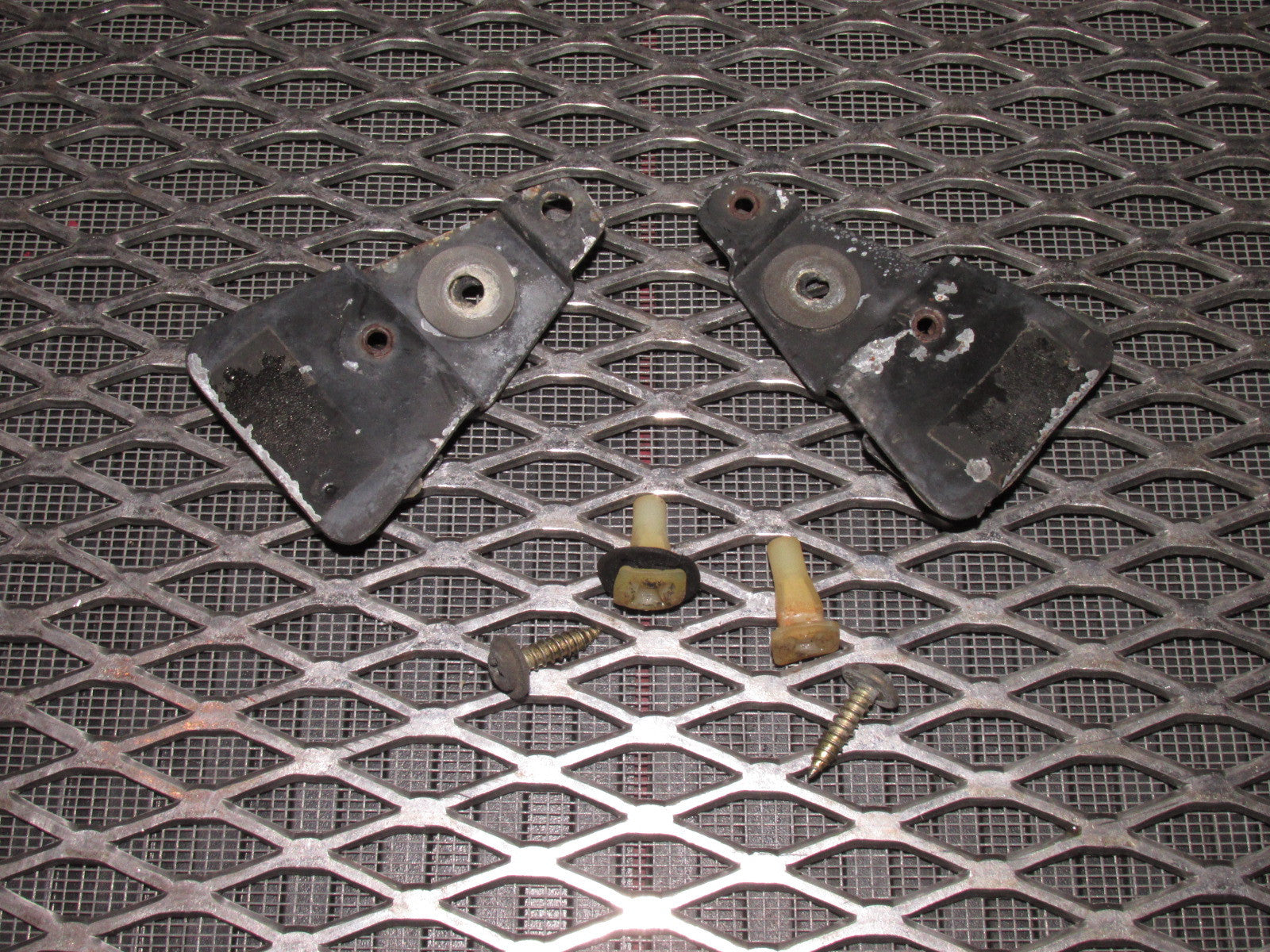 84 85 Mazda RX7 OEM Rear Quarter Window Trim Bracket - Set
