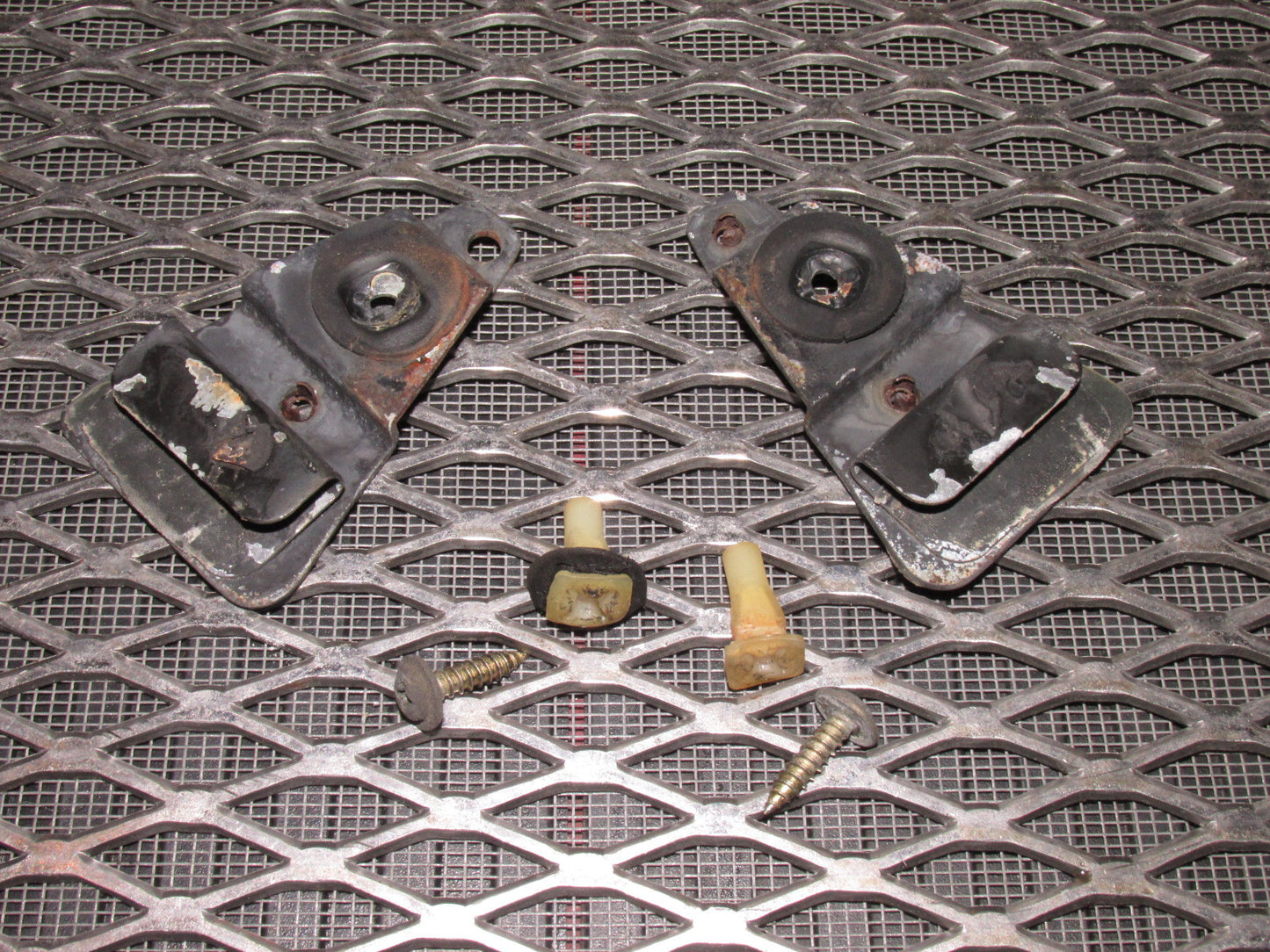 84 85 Mazda RX7 OEM Rear Quarter Window Trim Bracket - Set