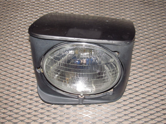 81-83 Mazda RX7 OEM Headlight Assembly - Left