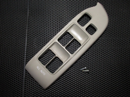 03 04 Infiniti G35 OEM 4 Door Tan Window Switch Bezel Trim - Front Left