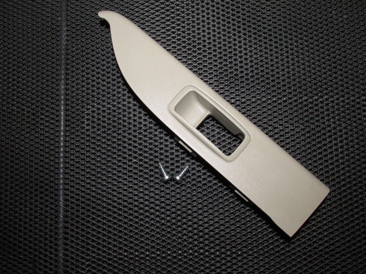 03 04 Infiniti G35 OEM 4 Door Tan Window Switch Bezel Trim - Rear Left