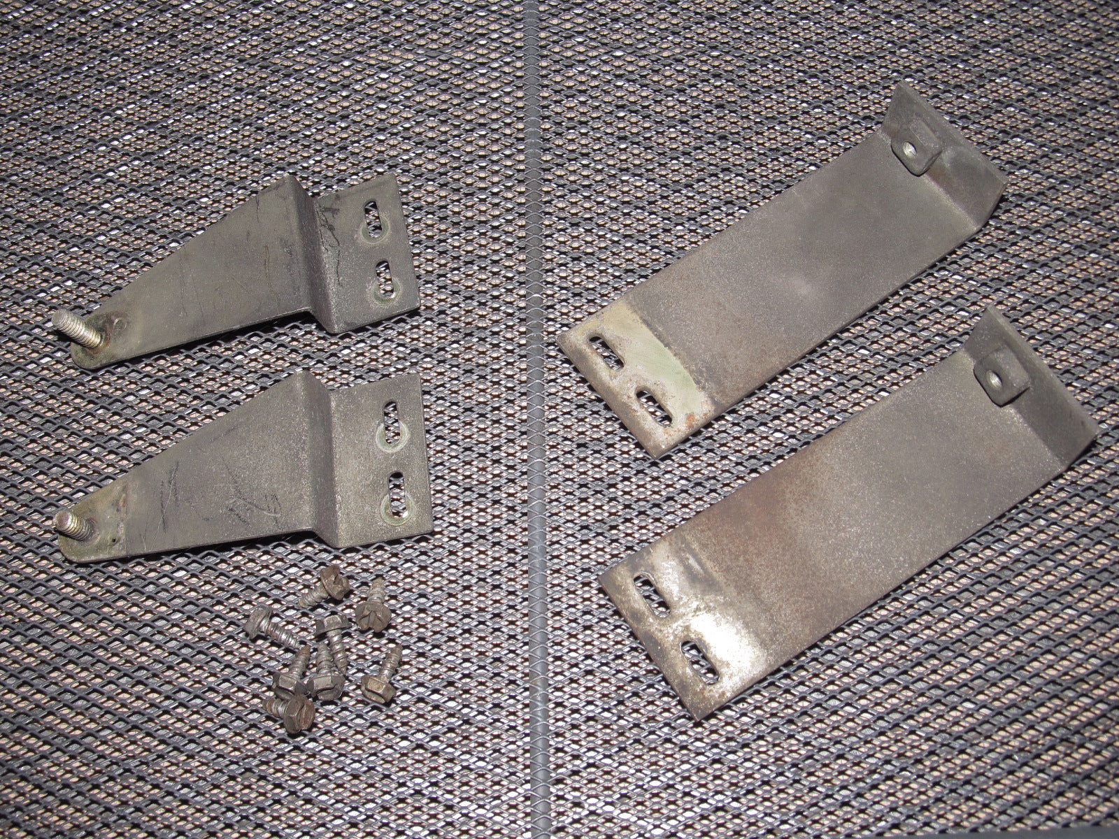 81-83 Mazda RX7 OEM A/C Condenser Mounting Bracket