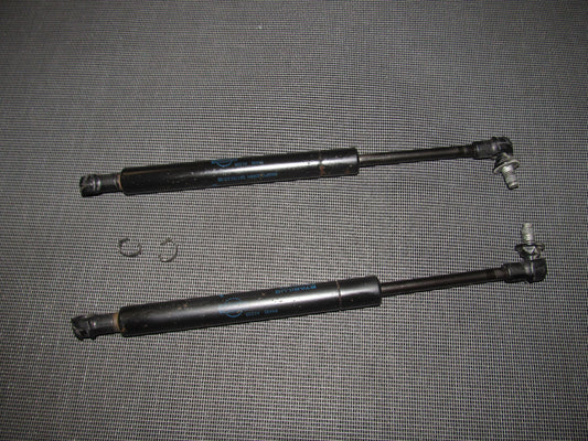 03 04 Infiniti G35 OEM Sedan Trunk Strut Shock Set