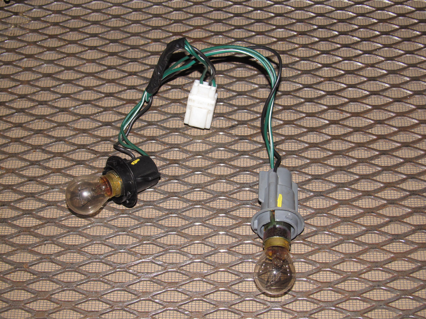 97 98 99 Mitsubishi Eclipse OEM Tail Light Bulb Socket - Left