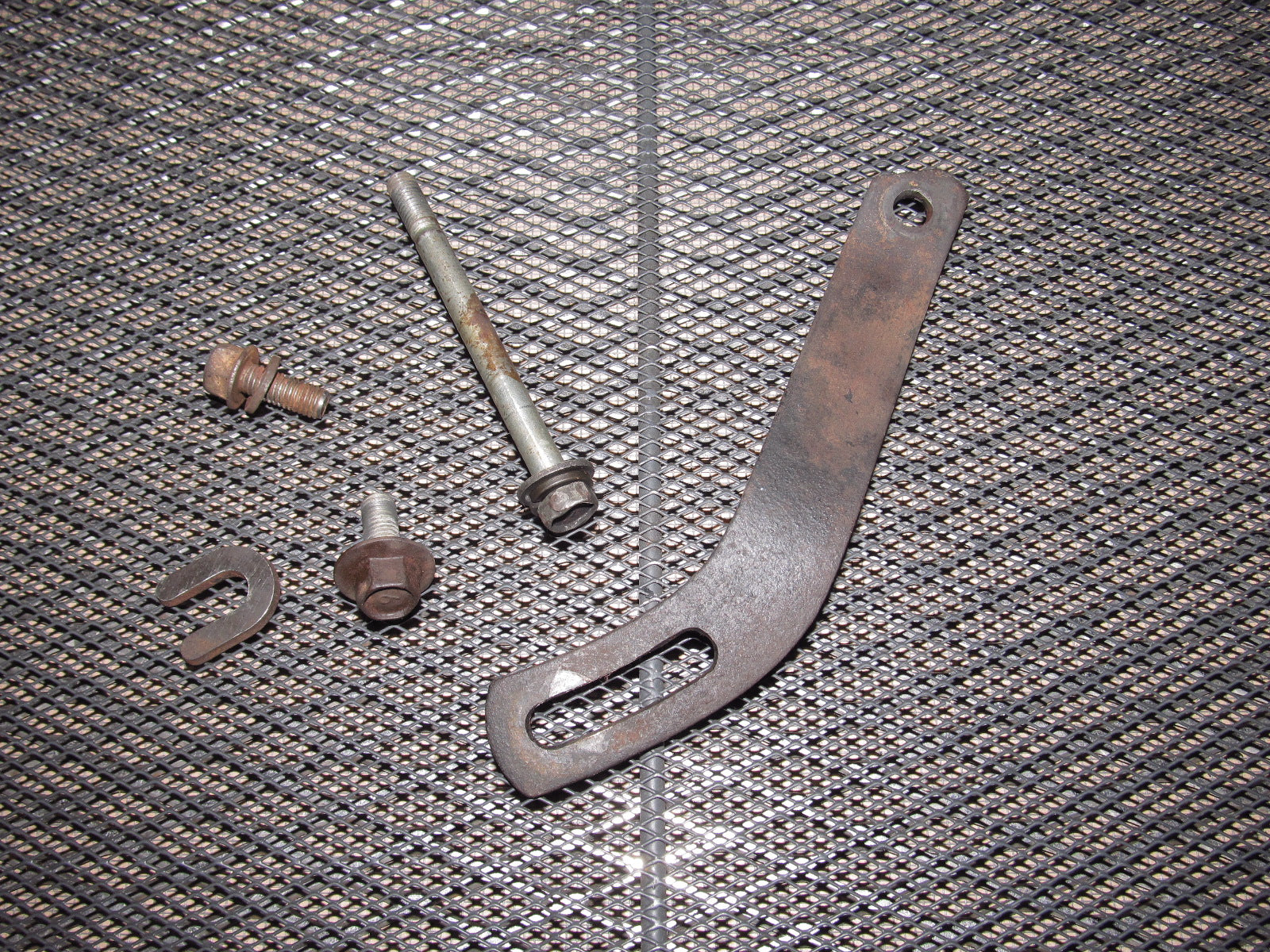 81-83 Mazda RX7 OEM Air Pump Adjustment Bracket