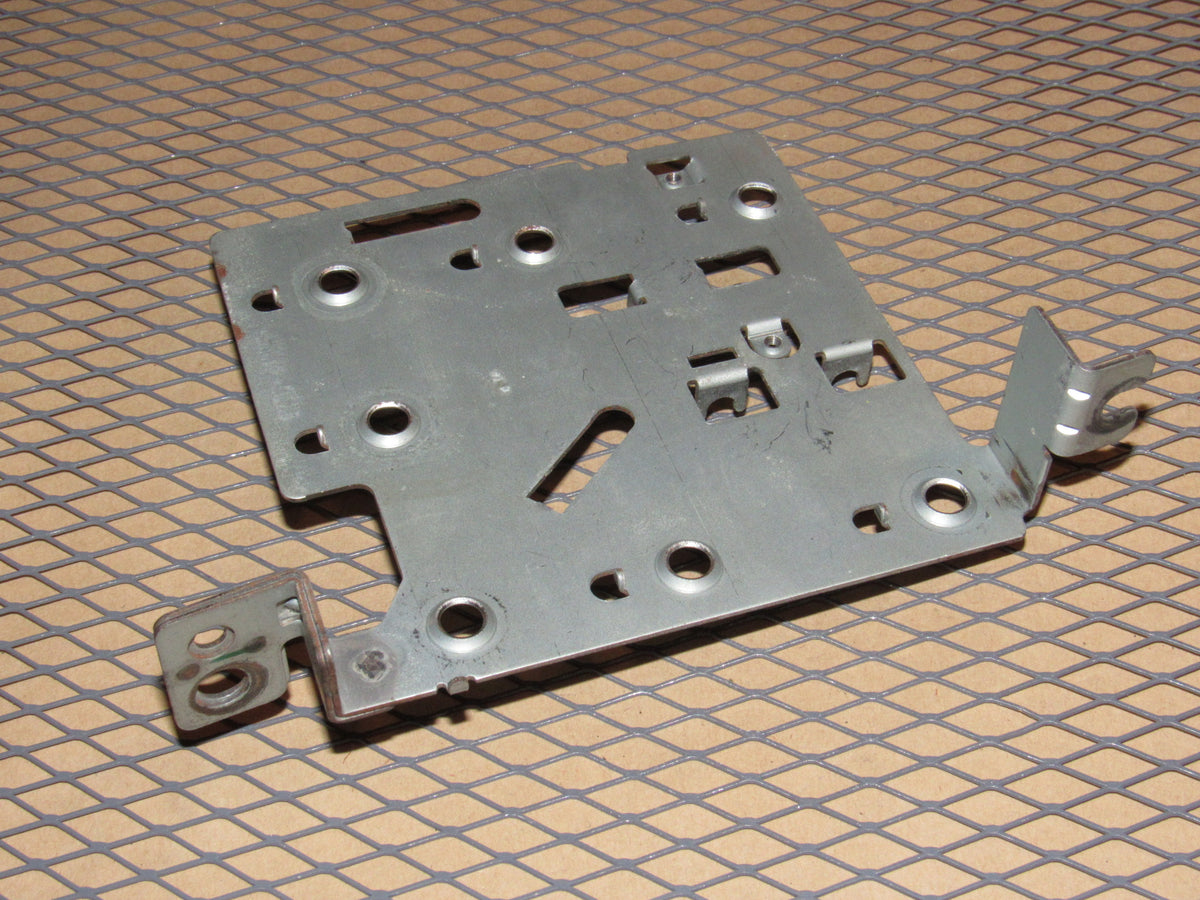 86 87 88 Mazda RX7 OEM Dash Stereo Radio Mounting Bracket