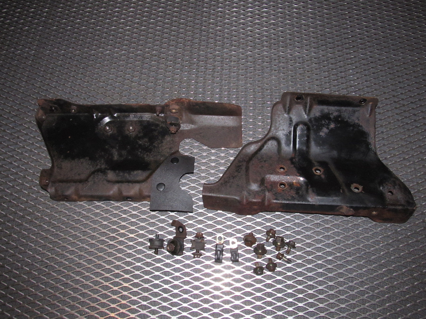 84 85 Mazda RX7 OEM A/C Condenser & Radiator Side Bracket Set