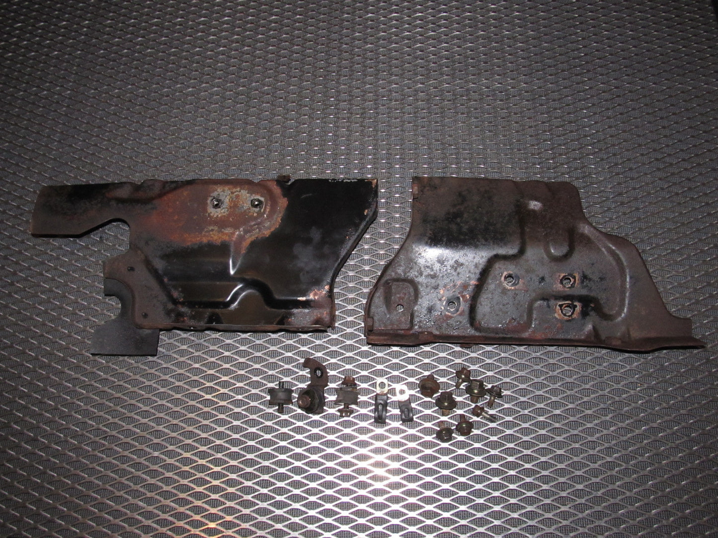 84 85 Mazda RX7 OEM A/C Condenser & Radiator Side Bracket Set