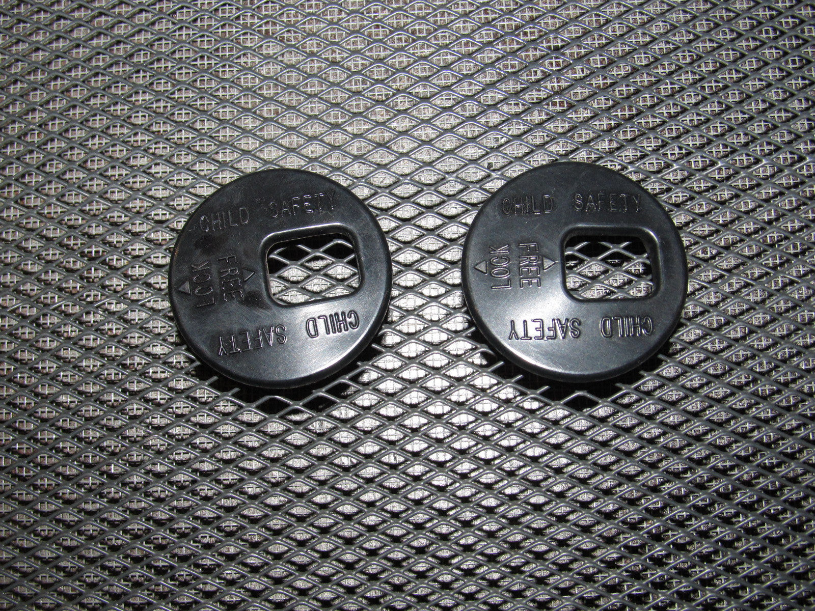 03 04 Infiniti G35 OEM Sedan Rear Child Safety Lock Bezel Cover