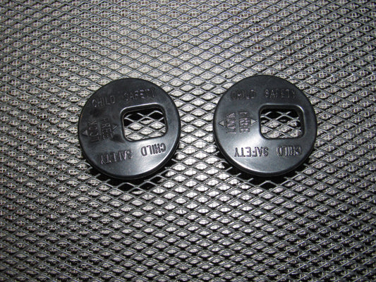 03 04 Infiniti G35 OEM Sedan Rear Child Safety Lock Bezel Cover