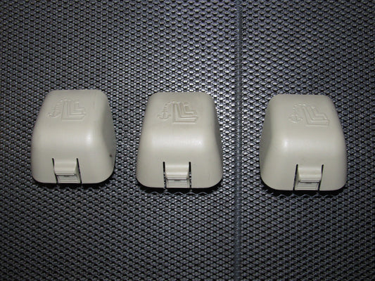 03 04 Infiniti G35 OEM Sedan Rear Seat Release Lock Cover