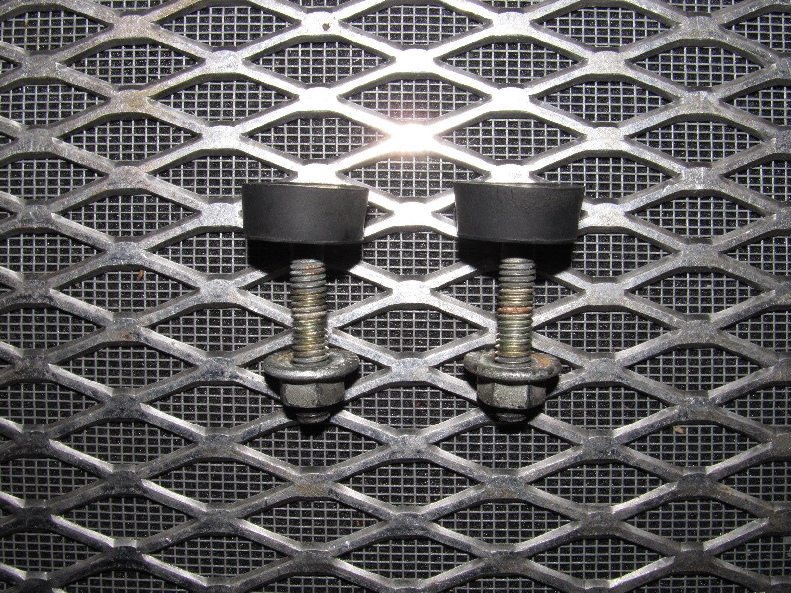 84 85 Mazda RX7 OEM Headlight Stopper - Set