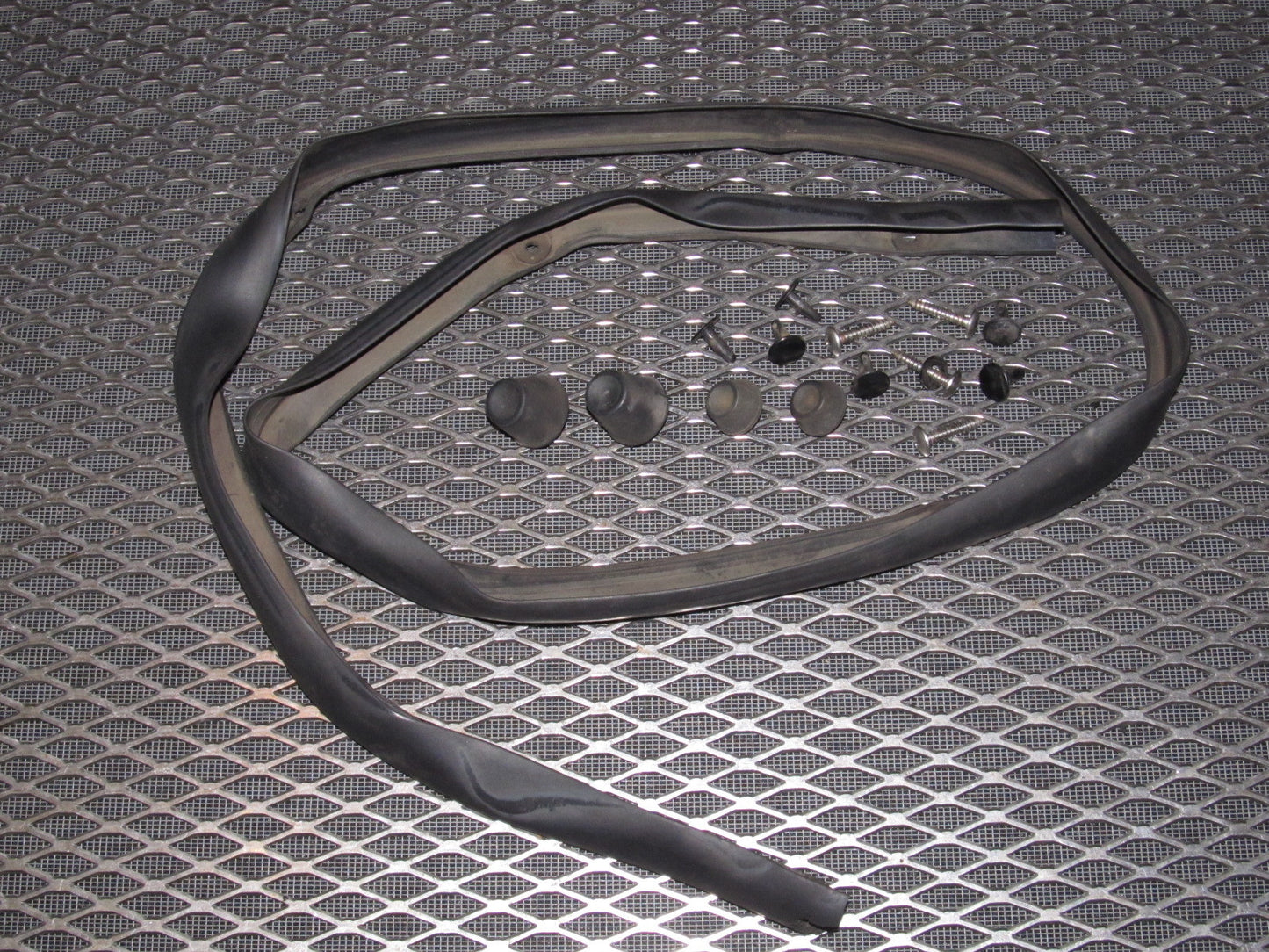 84 85 Mazda RX7 OEM Hood Stopper & Stripping