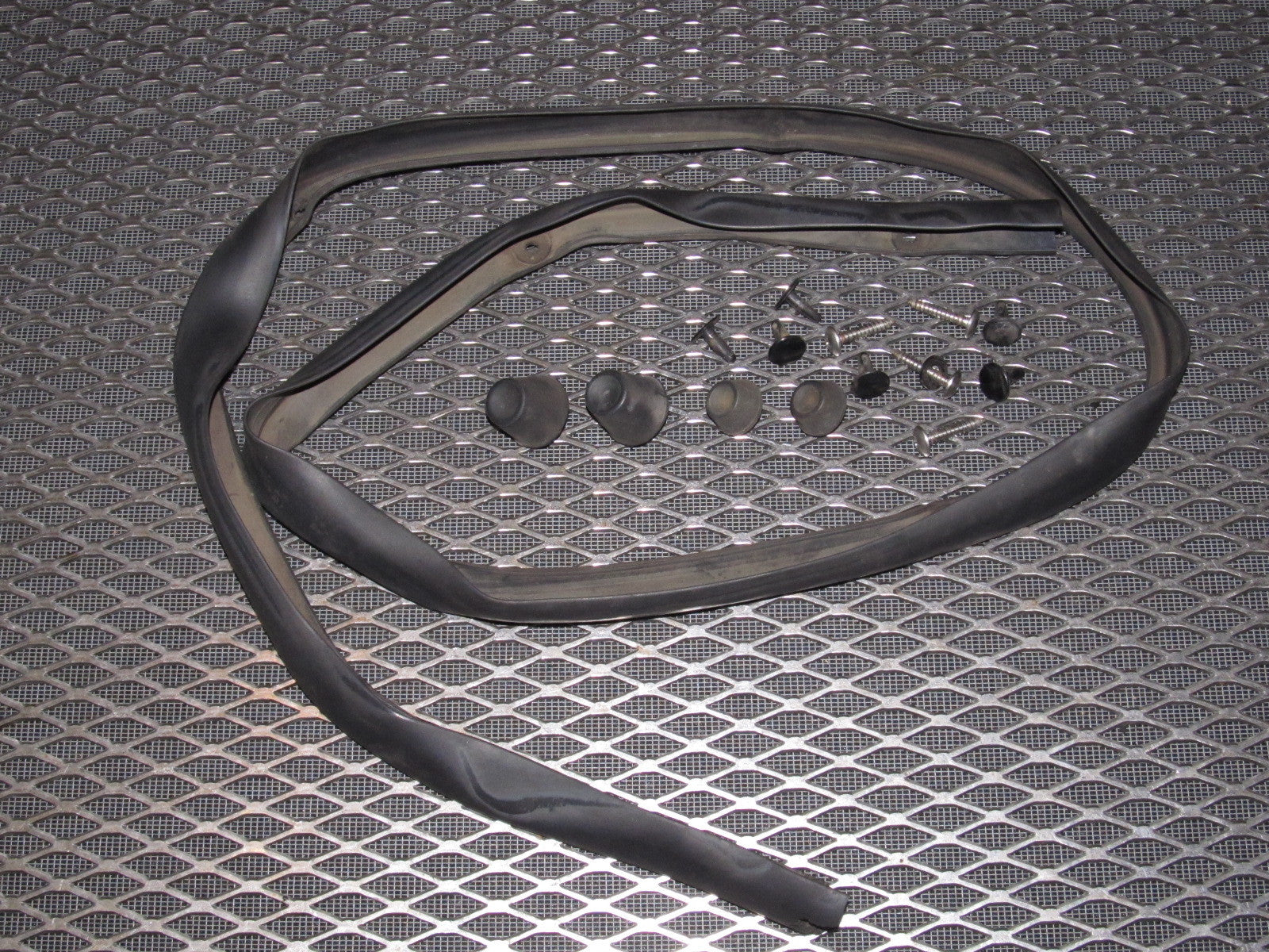 84 85 Mazda RX7 OEM Hood Stopper & Stripping