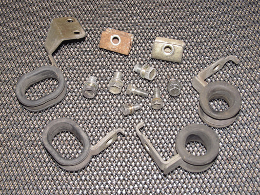 91 92 93 94 95 Toyota MR2 OEM Parking Brake Cable Holder Mount Bracket Set