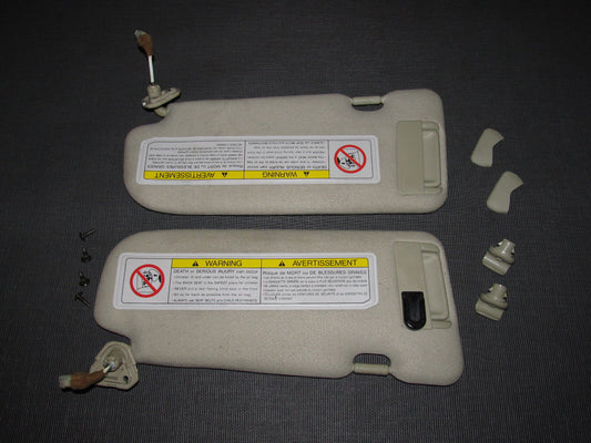 03 04 Infiniti G35 OEM Sun Visor Set