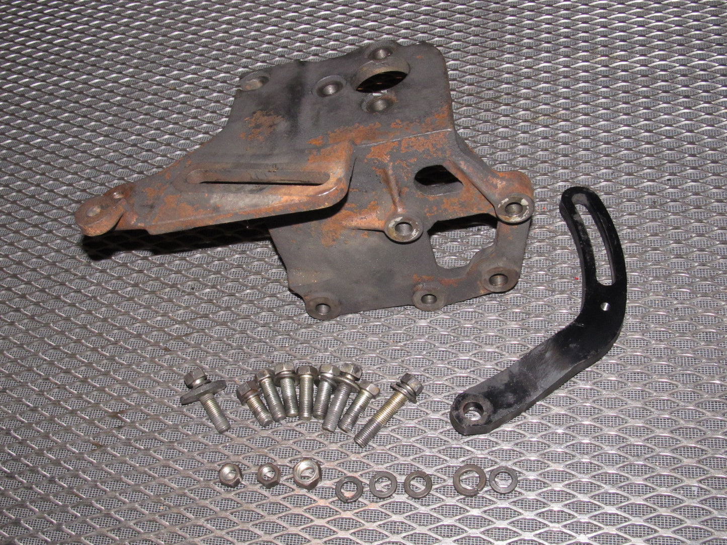 84 85 Mazda RX7 OEM 12A Power Steering Pump & A/C Compressor Mounting Bracket