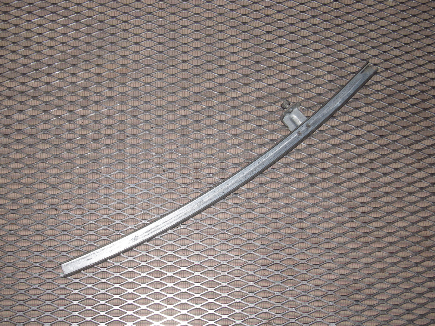 81-83 Mazda RX7 OEM Manual Window Guide - Left