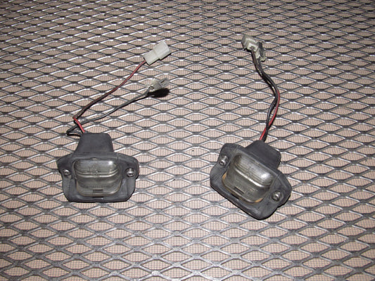 81-83 Mazda RX7 OEM Rear License Plate Light