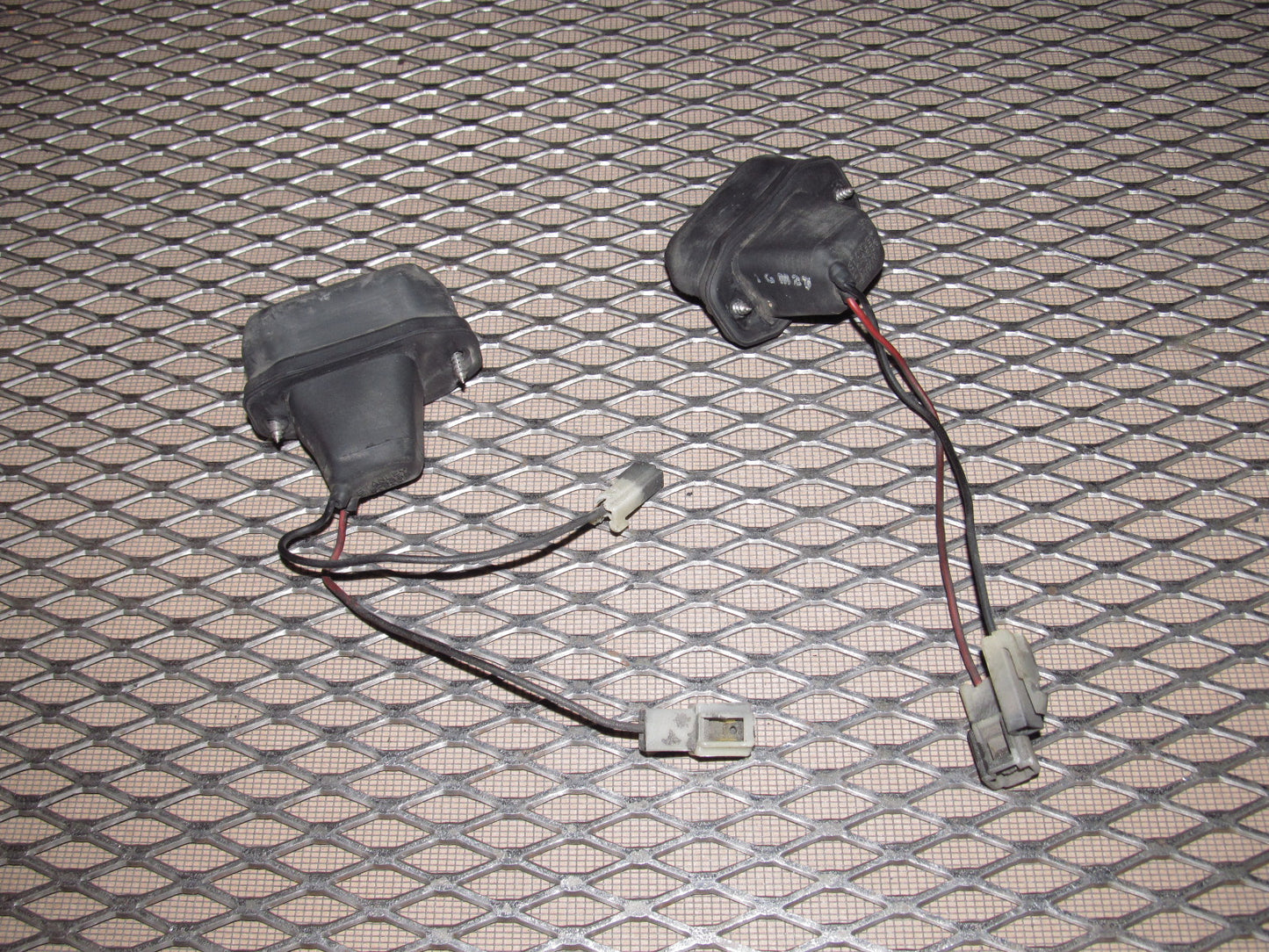 81-83 Mazda RX7 OEM Rear License Plate Light