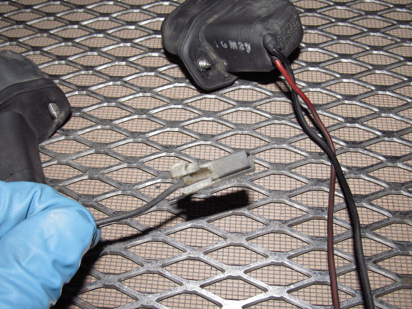 81-83 Mazda RX7 OEM Rear License Plate Light