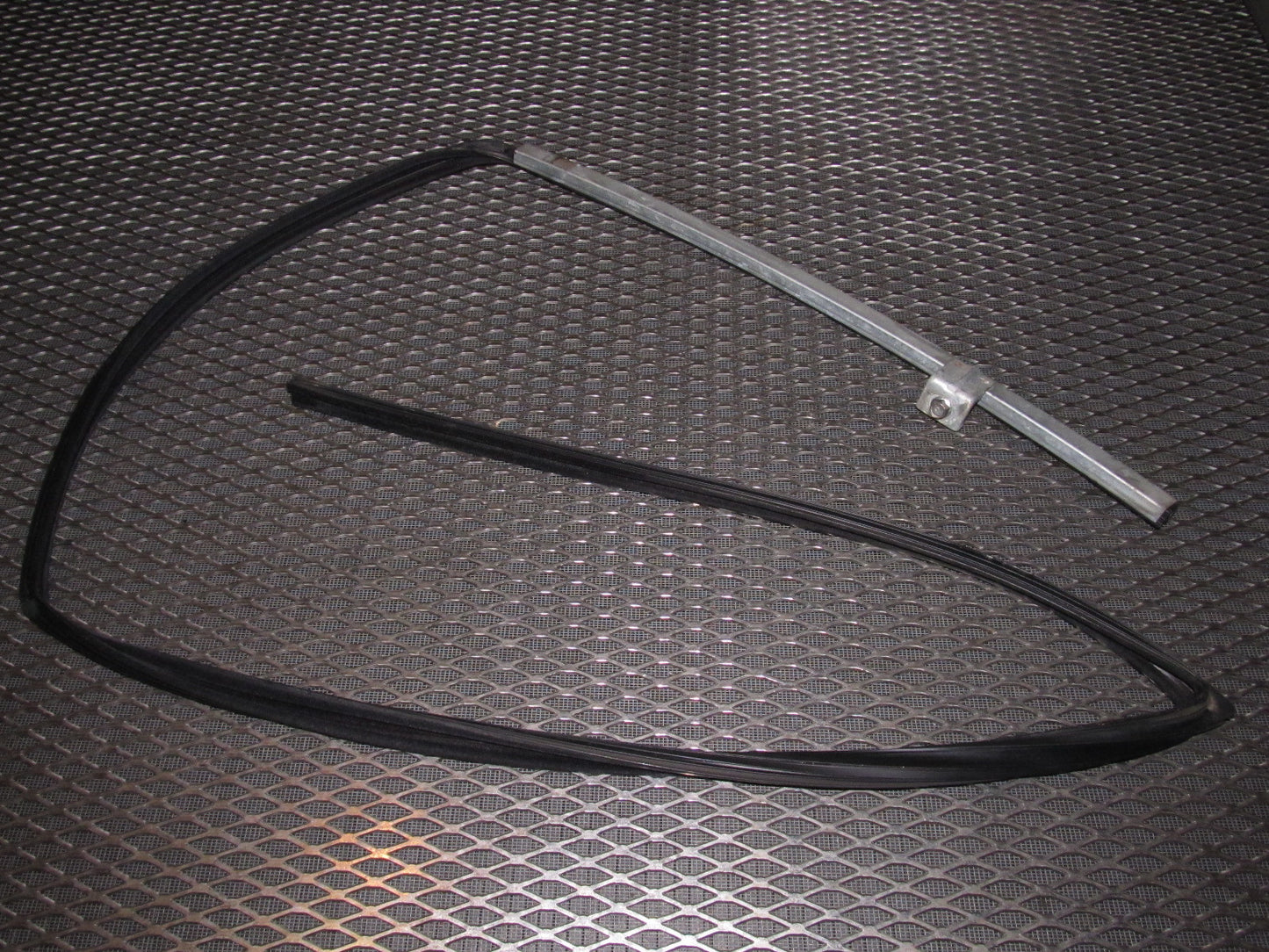 84 85 Mazda RX7 OEM Power Window Guide Assembly - Left