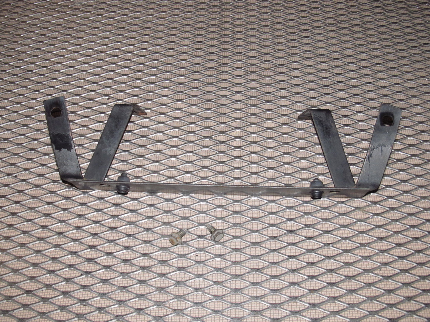 81-83 Mazda RX7 OEM Rear License Plate Holder Bracket