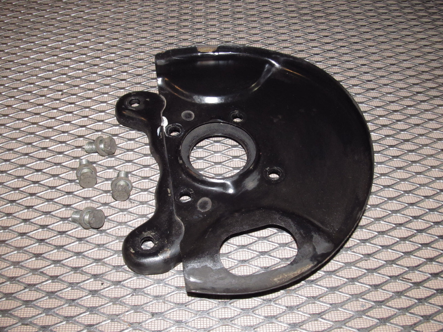 81-83 Mazda RX7 OEM Front Spindle Brake Dust Cover - Right