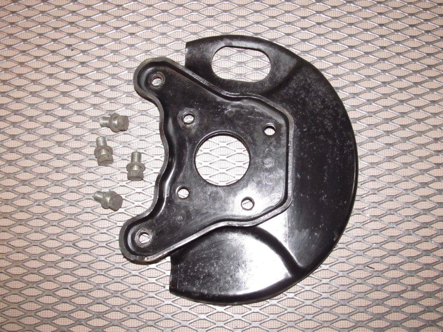 81-83 Mazda RX7 OEM Front Spindle Brake Dust Cover - Right