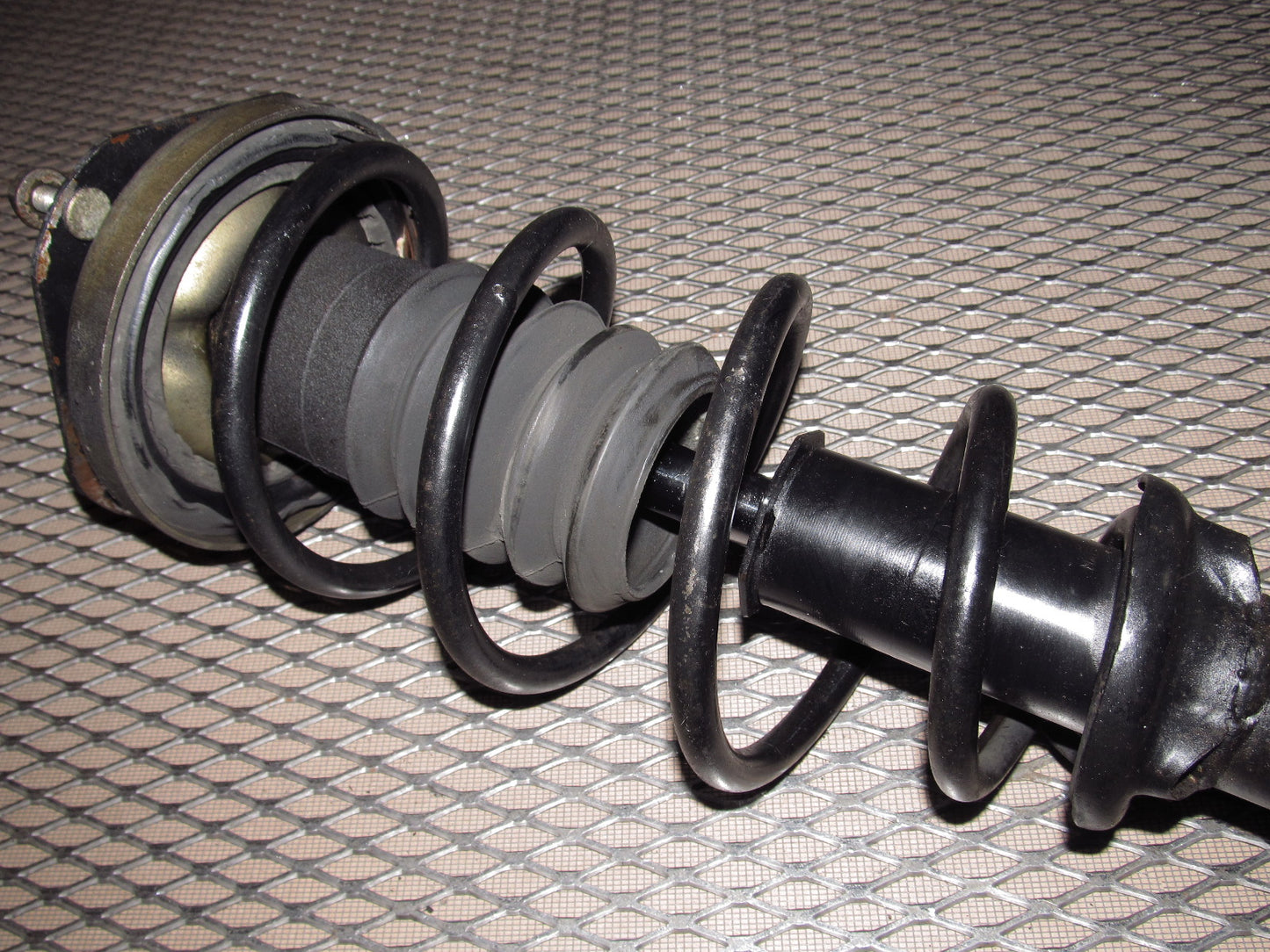 81-83 Mazda RX7 OEM Front Shock Spring & Spindle Assembly - Left