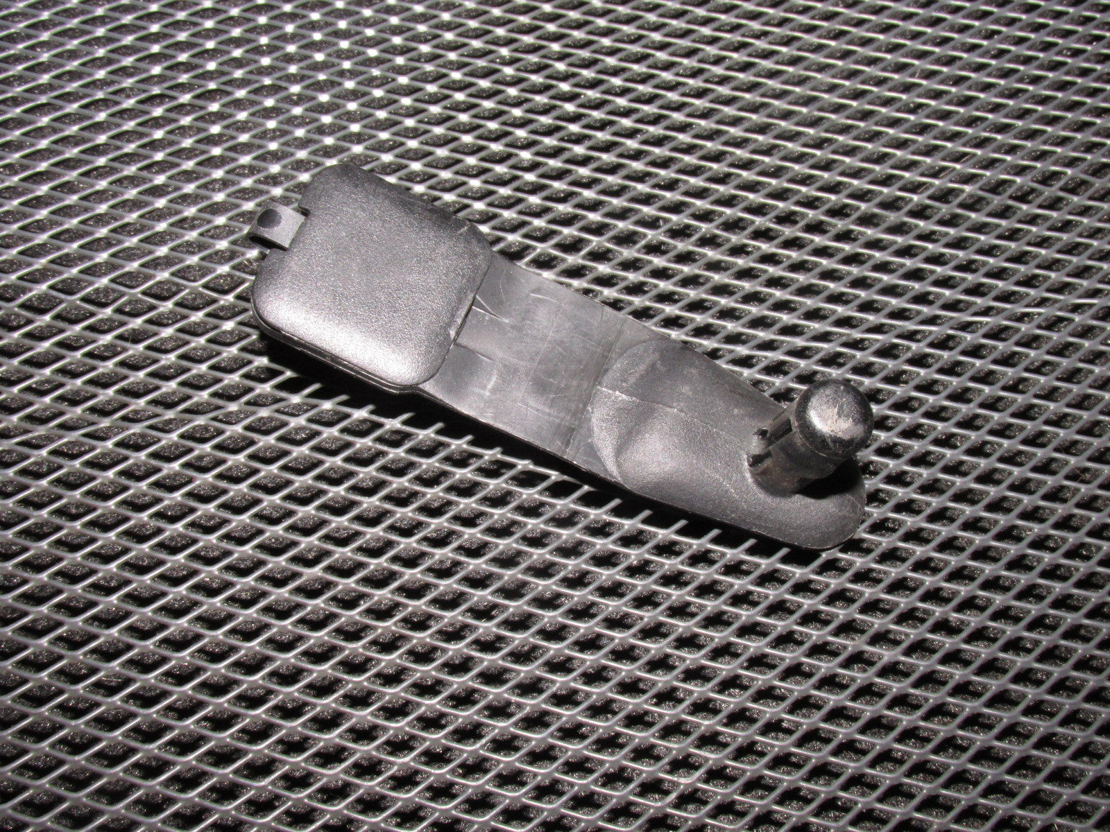 03 04 Infiniti G35 OEM Carpet Holder - Front Left