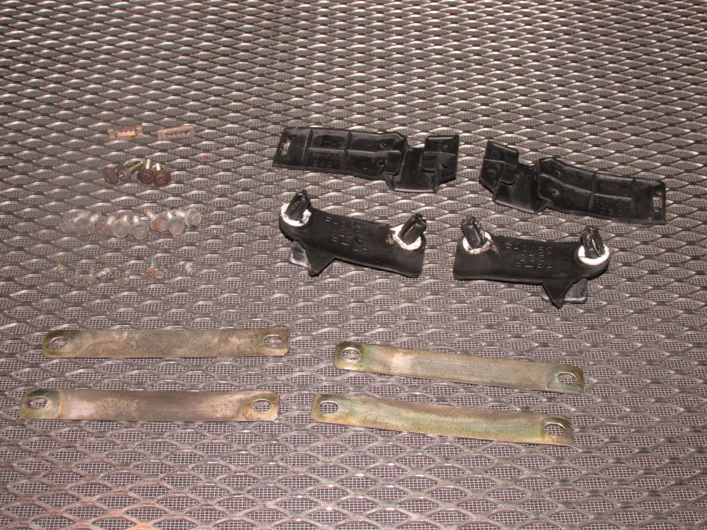 84 85 Mazda RX7 OEM Rear Bumper Mounting Bracket - Set