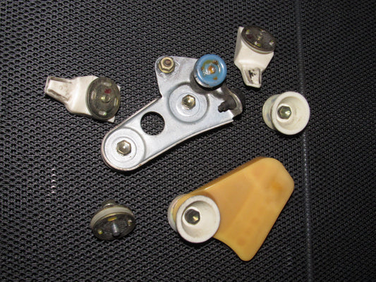 86 87 88 Toyota Supra OEM Window Glass Roller & Bracket - Left Set