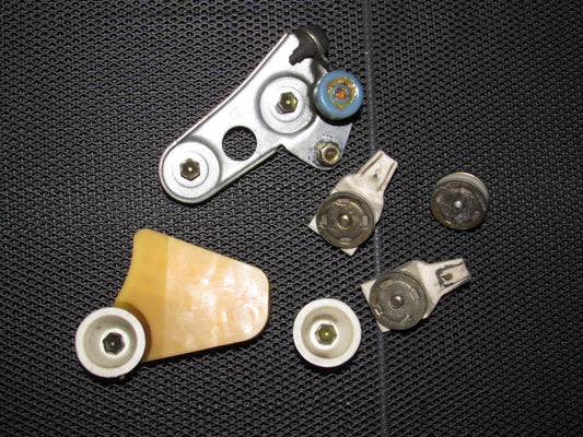86 87 88 Toyota Supra OEM Window Glass Roller & Bracket - Right Set