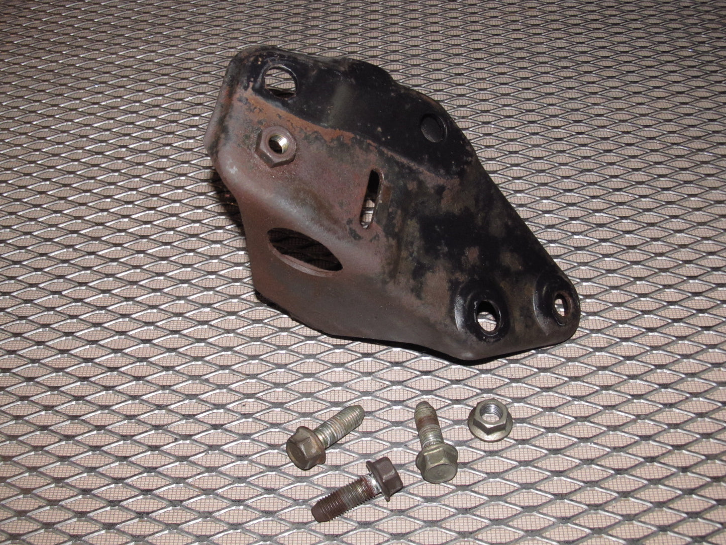 81-83 Mazda RX7 OEM Front Control Strut Rod Bracket - Left