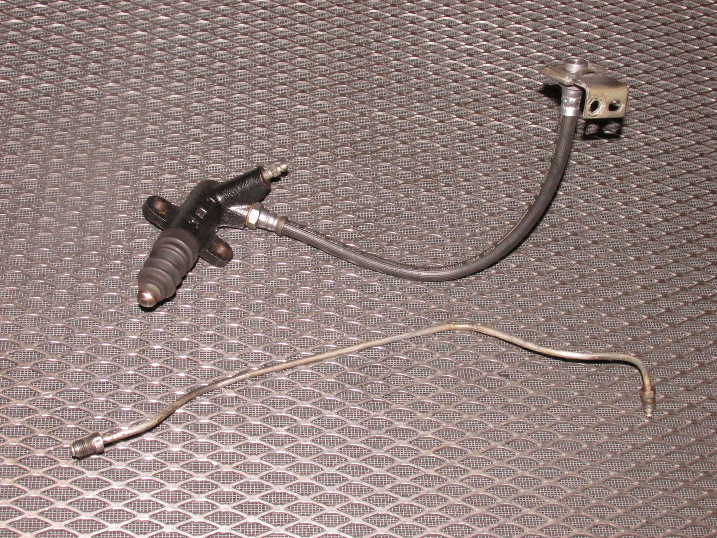 84 85 Mazda RX7 OEM 12A Clutch Slave Cylinder & Linkage
