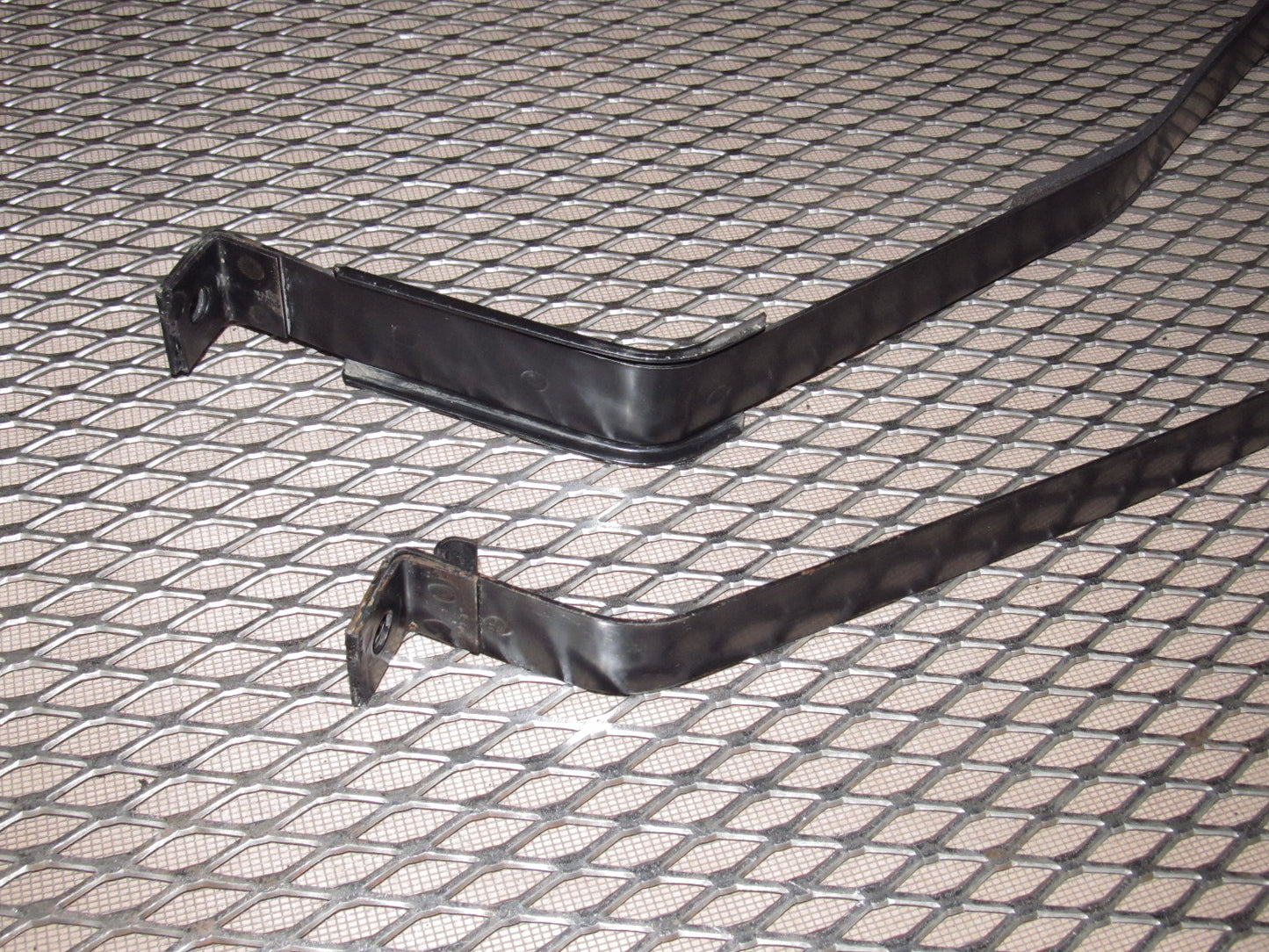 81-83 Mazda RX7 OEM Gas Tank Mounting Strapping