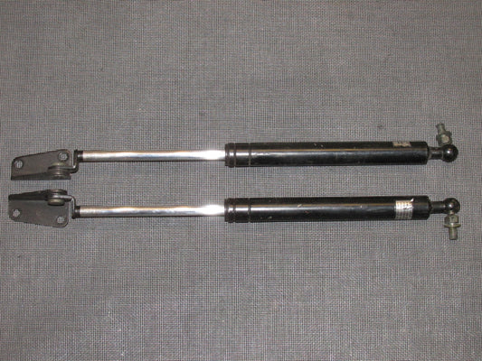 91 92 93 Dodge Stealth OEM Hood Strut Shock Set