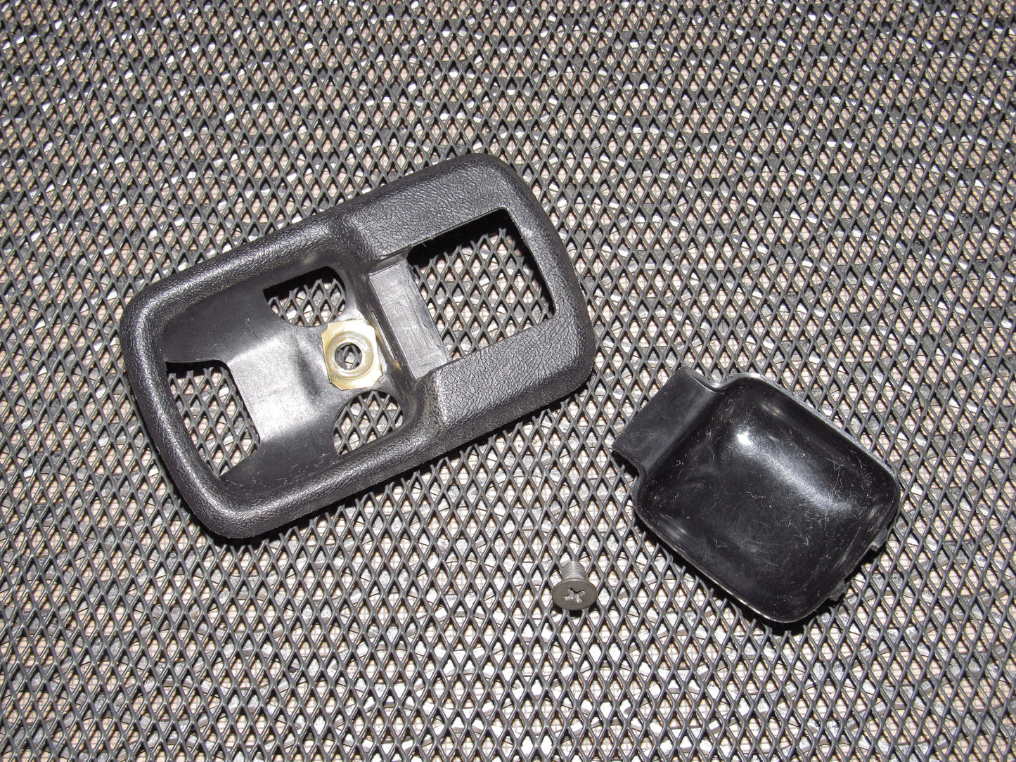 83-85 Porsche 944 OEM Interior Door Handle Bezel Trim - Left