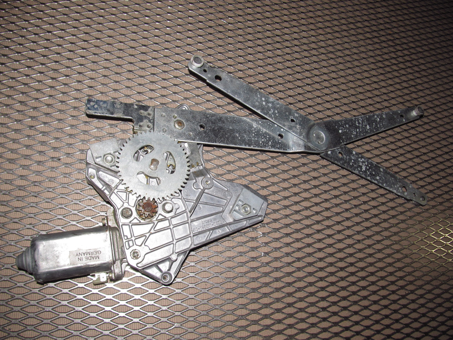 83-85 Porsche 944 OEM Window Regulator With Motor - Left