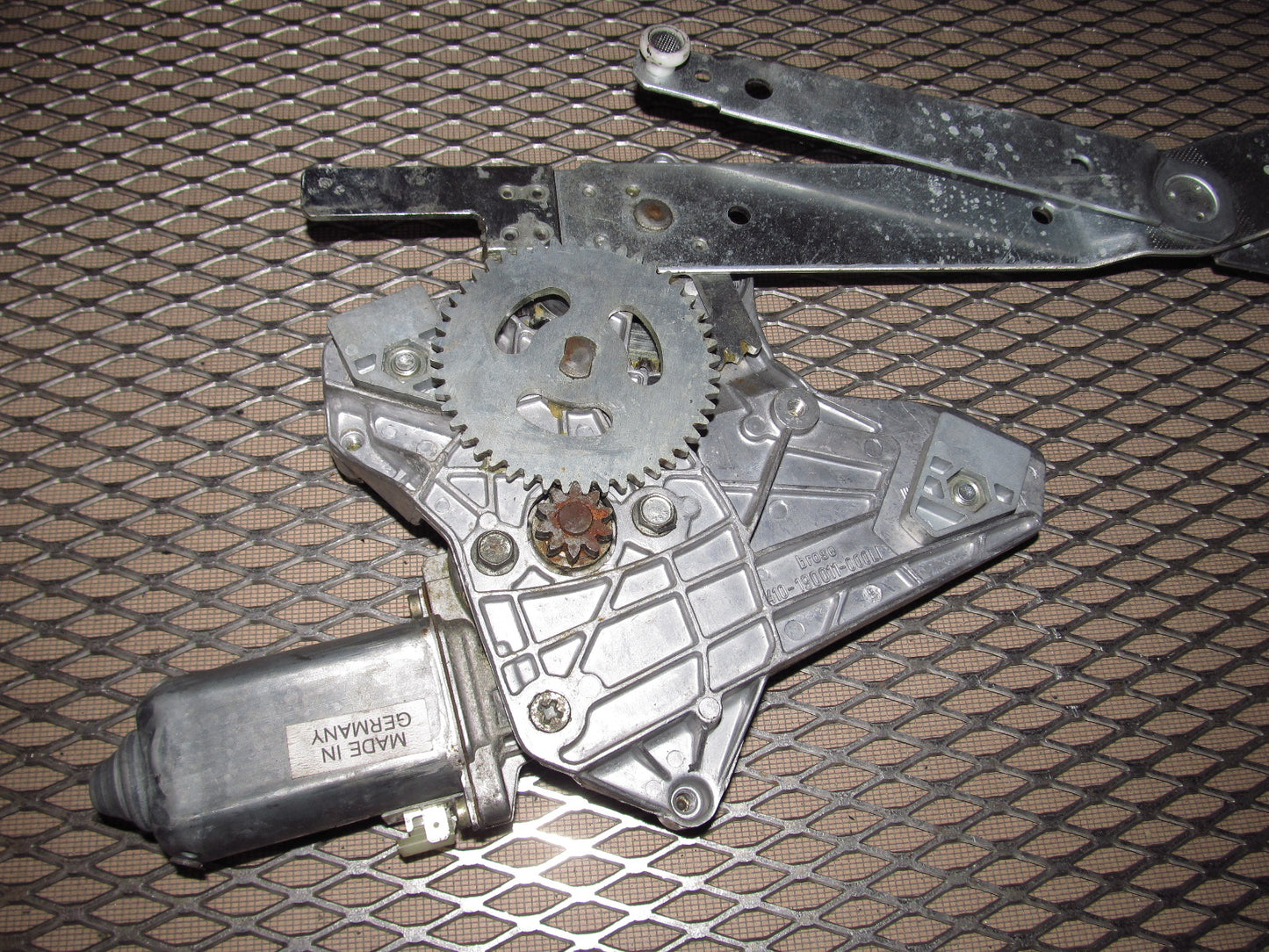 83-85 Porsche 944 OEM Window Regulator With Motor - Left