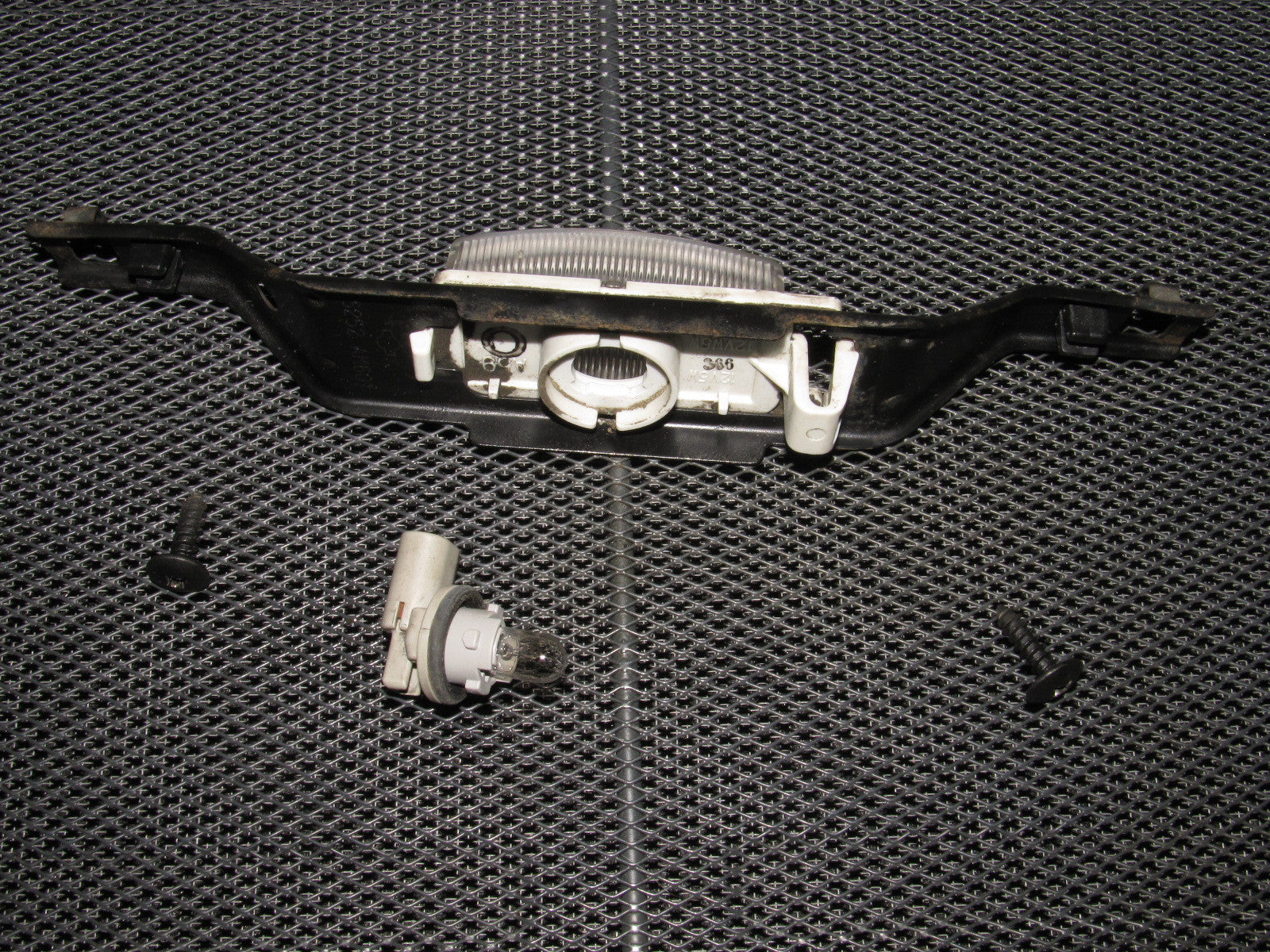 03 04 Infiniti G35 Sedan OEM Rear License Plate Light