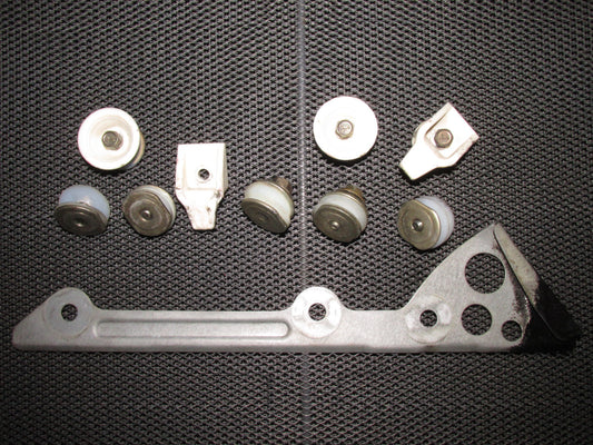 87 88 89 Toyota MR2 OEM Power Window Bracket & Roller - Left