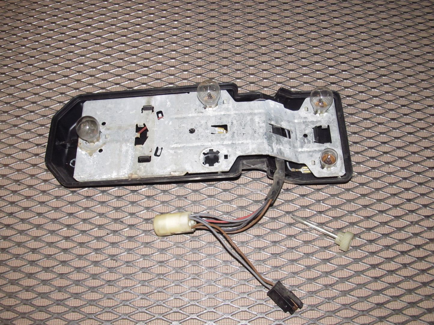 83-85 Porsche 944 OEM Tail Light Bulb Socket Panel - Right